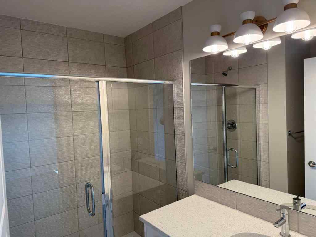 MLS® A2258128 - 318 Sundown Road  in Sunset Ridge Cochrane, Residential
