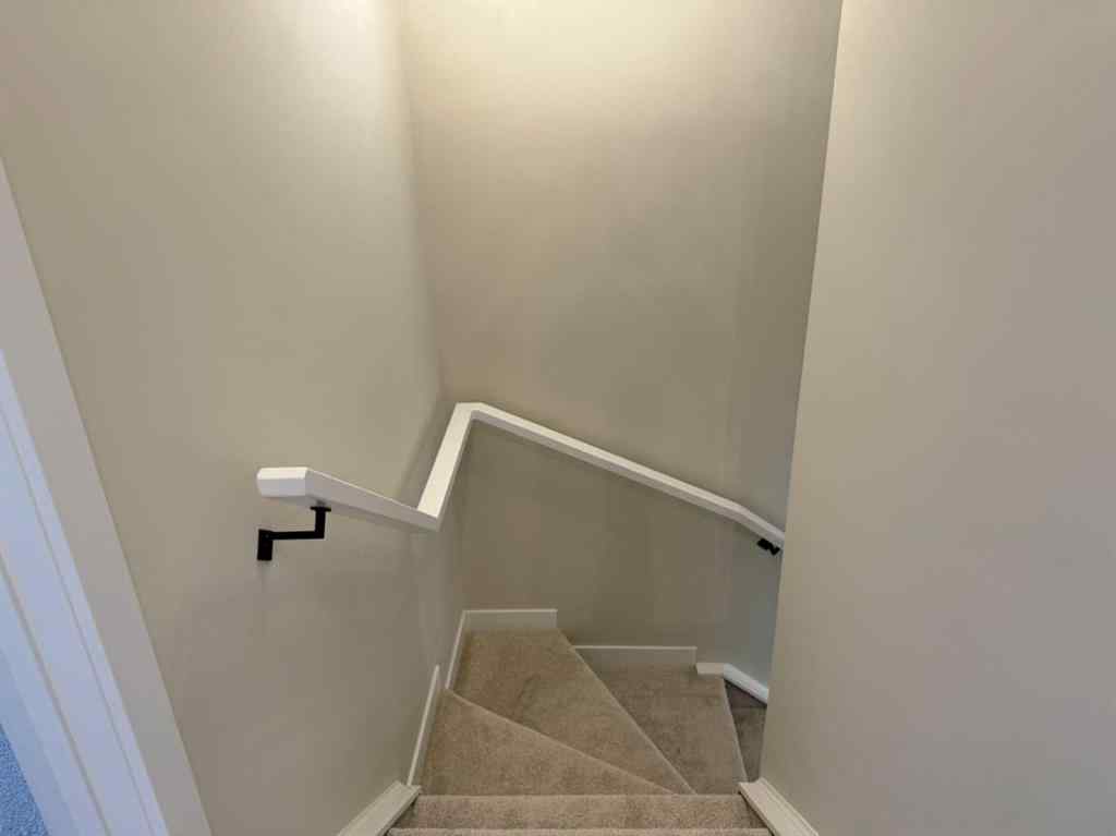 MLS® A2258128 - 318 Sundown Road  in Sunset Ridge Cochrane, Residential