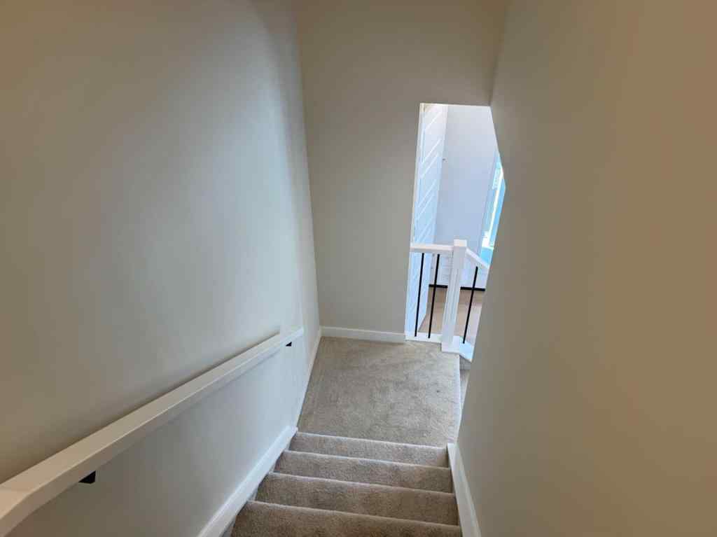 MLS® A2258128 - 318 Sundown Road  in Sunset Ridge Cochrane, Residential