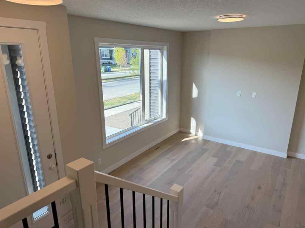 MLS® A2258128 - 318 Sundown Road  in Sunset Ridge Cochrane, Residential