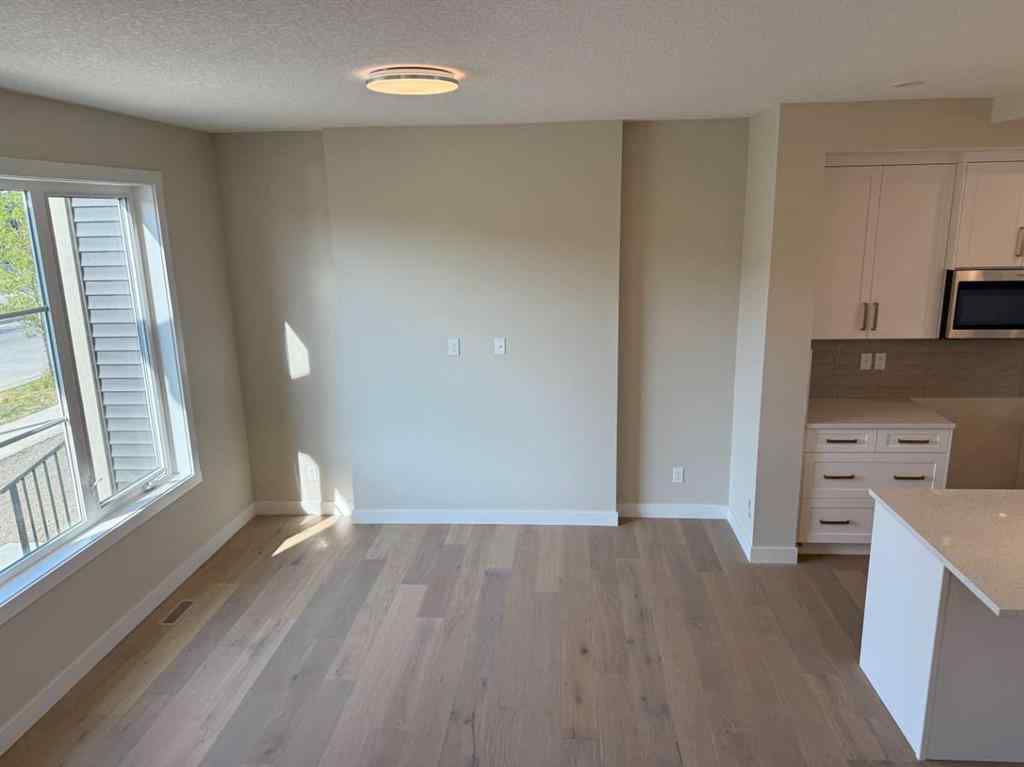 MLS® A2258128 - 318 Sundown Road  in Sunset Ridge Cochrane, Residential