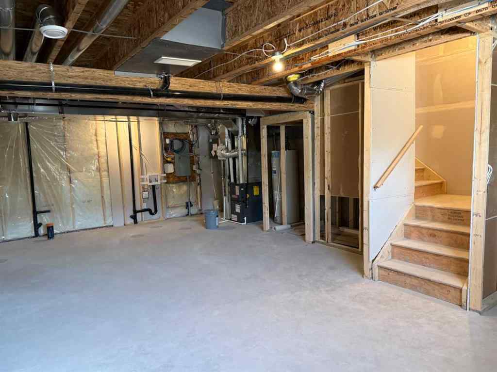 MLS® A2258128 - 318 Sundown Road  in Sunset Ridge Cochrane, Residential