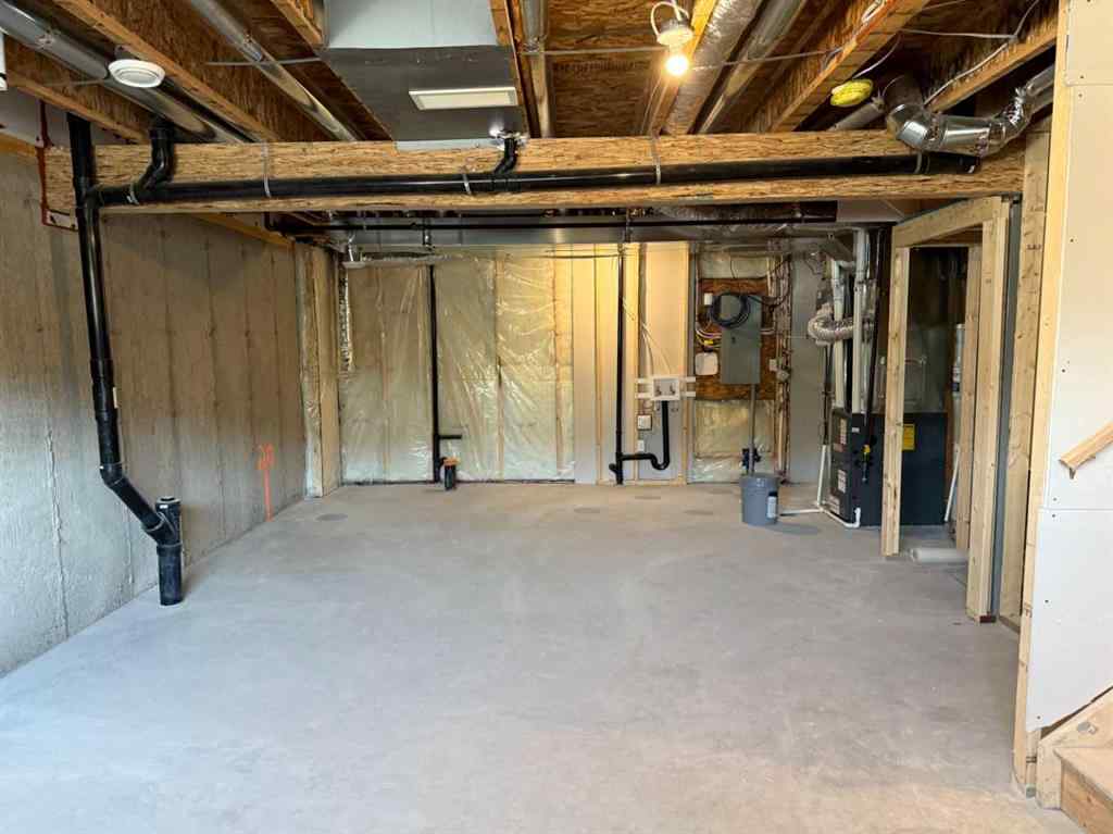 MLS® A2258128 - 318 Sundown Road  in Sunset Ridge Cochrane, Residential