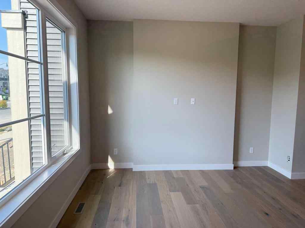 MLS® A2258128 - 318 Sundown Road  in Sunset Ridge Cochrane, Residential