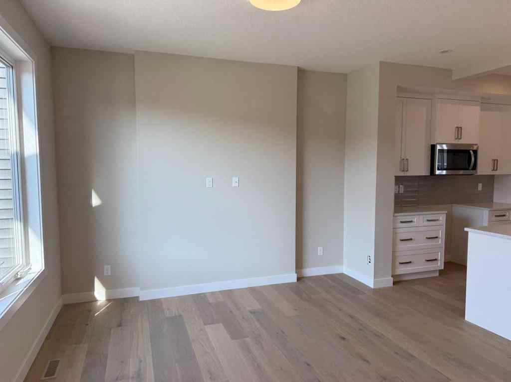 MLS® A2258128 - 318 Sundown Road  in Sunset Ridge Cochrane, Residential