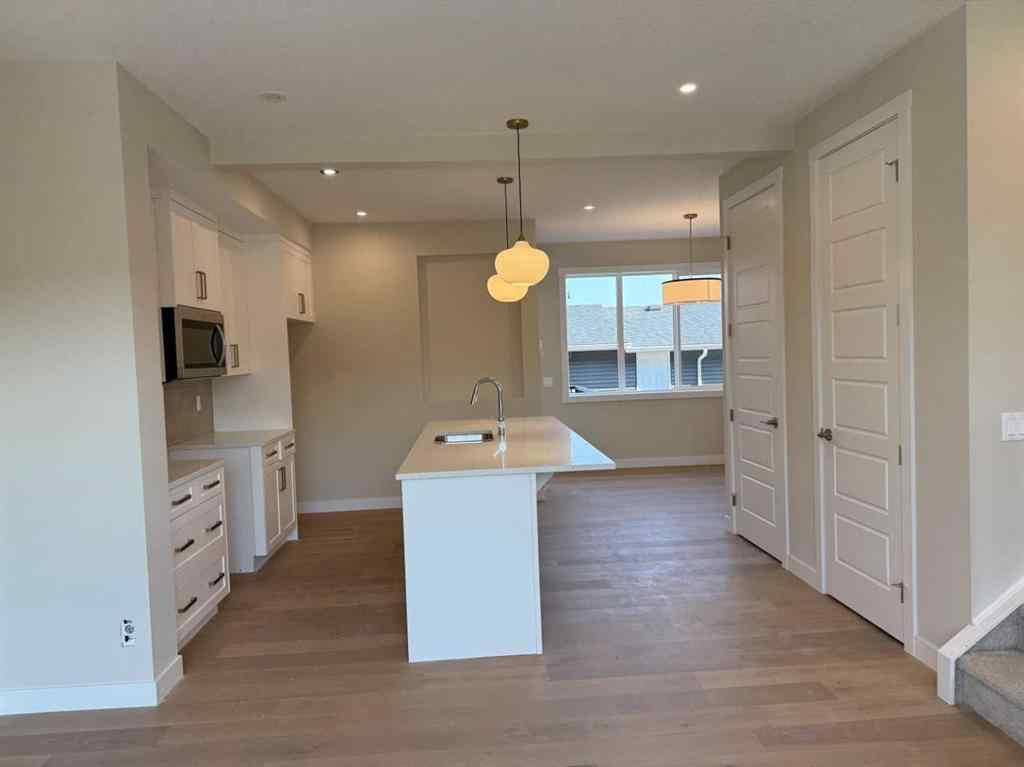 MLS® A2258128 - 318 Sundown Road  in Sunset Ridge Cochrane, Residential