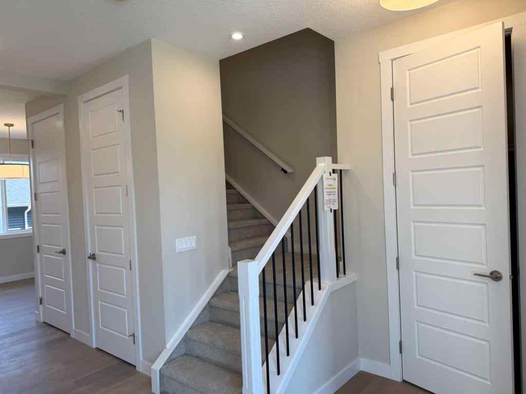MLS® A2258128 - 318 Sundown Road  in Sunset Ridge Cochrane, Residential