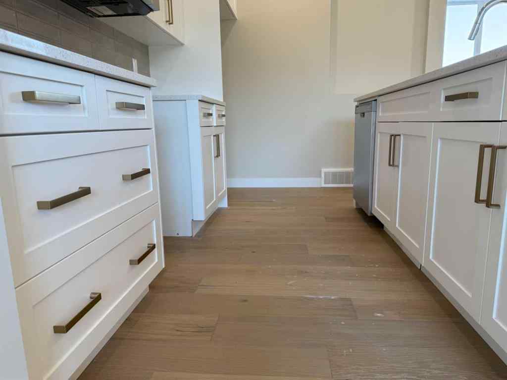 MLS® A2258128 - 318 Sundown Road  in Sunset Ridge Cochrane, Residential