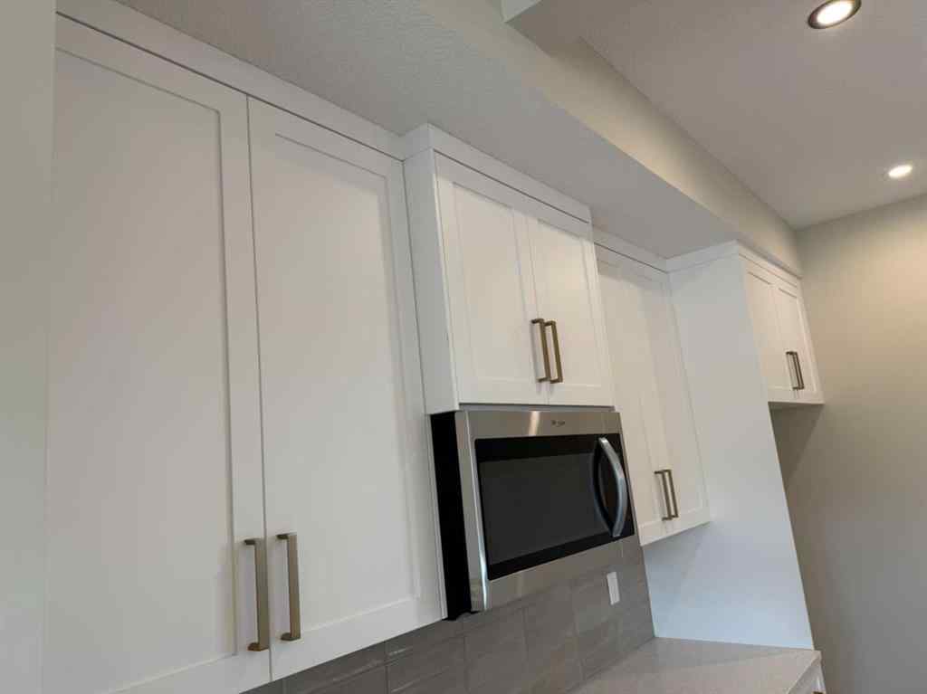 MLS® A2258128 - 318 Sundown Road  in Sunset Ridge Cochrane, Residential