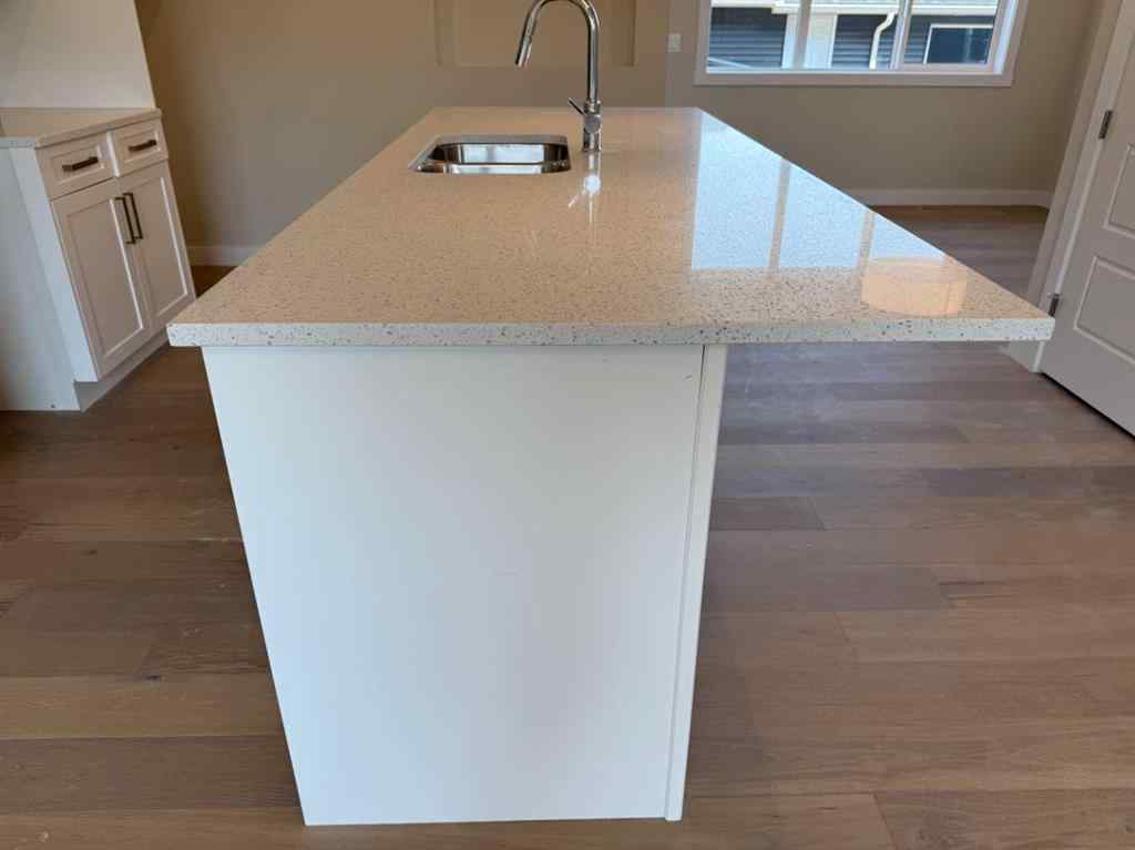 MLS® A2258128 - 318 Sundown Road  in Sunset Ridge Cochrane, Residential