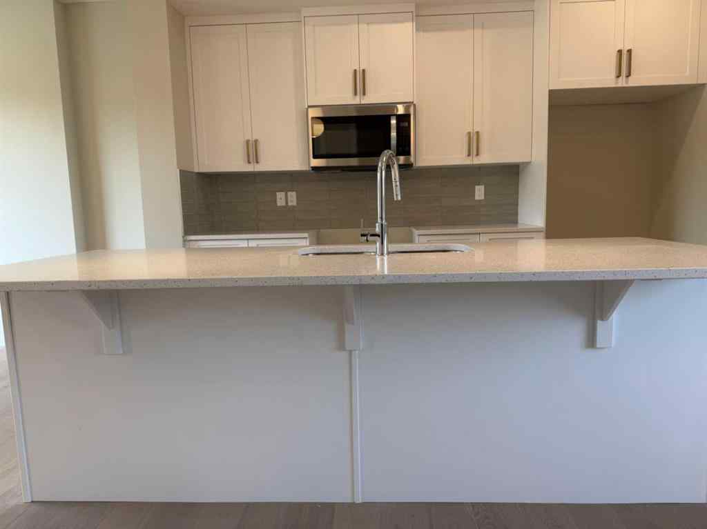 MLS® A2258128 - 318 Sundown Road  in Sunset Ridge Cochrane, Residential