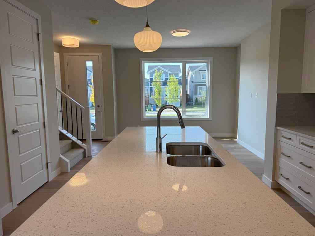 MLS® A2258128 - 318 Sundown Road  in Sunset Ridge Cochrane, Residential