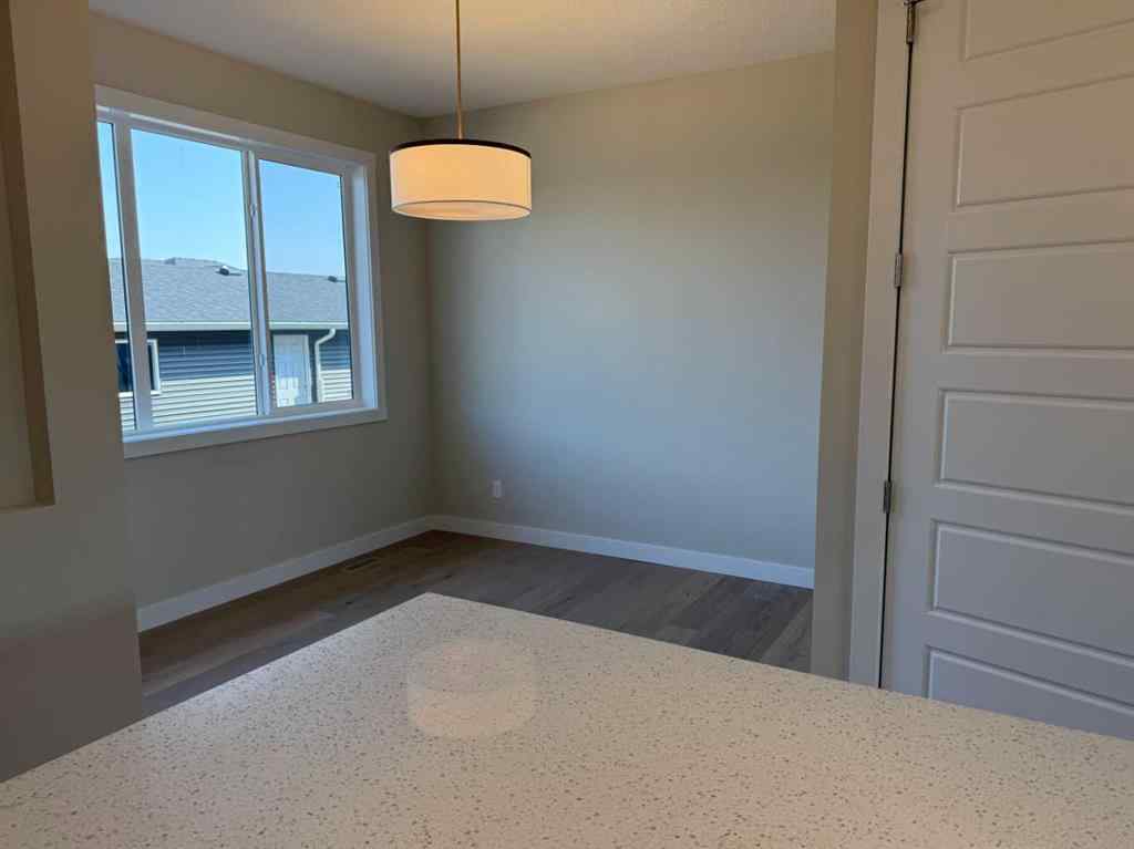 MLS® A2258128 - 318 Sundown Road  in Sunset Ridge Cochrane, Residential