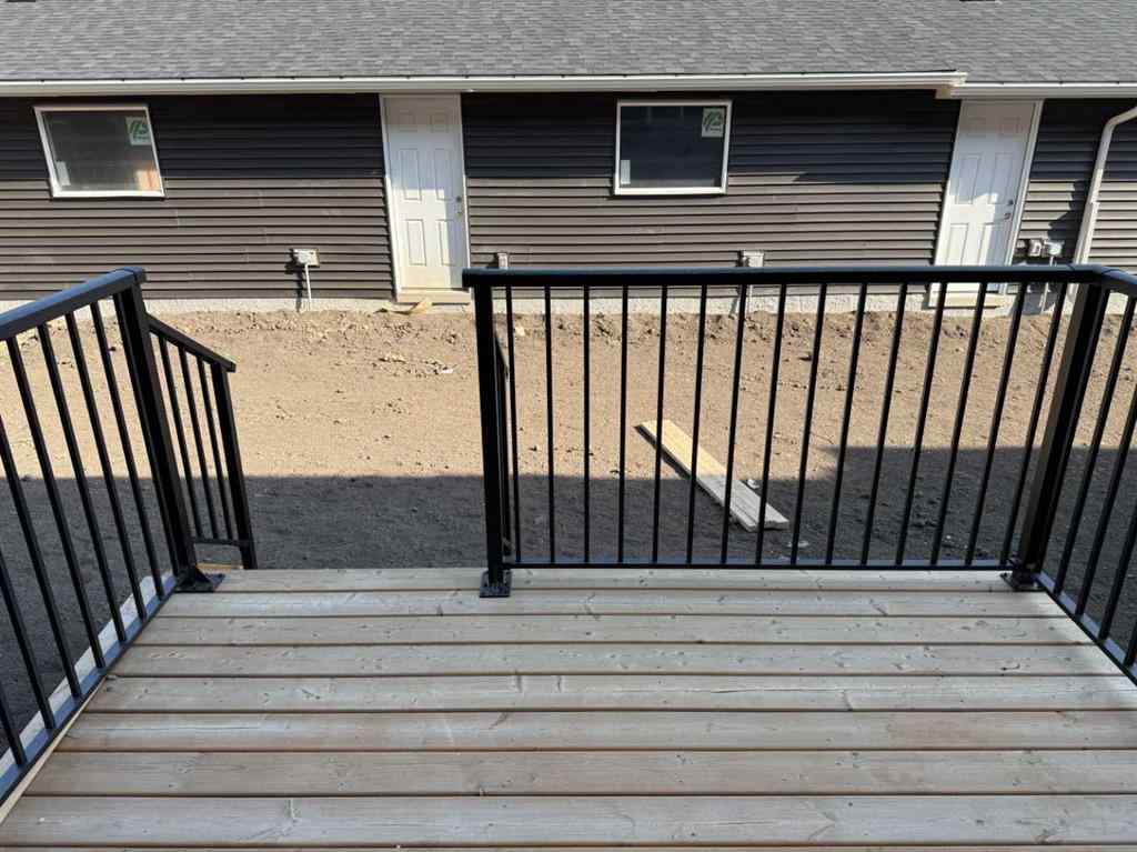 MLS® A2258128 - 318 Sundown Road  in Sunset Ridge Cochrane, Residential