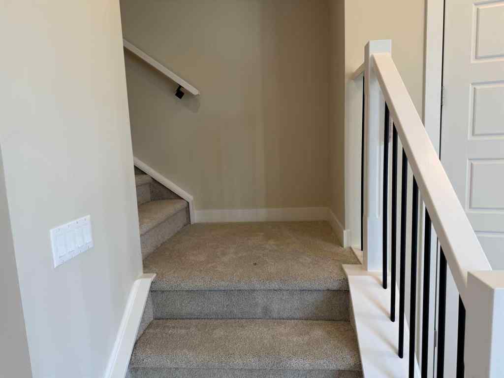 MLS® A2258128 - 318 Sundown Road  in Sunset Ridge Cochrane, Residential