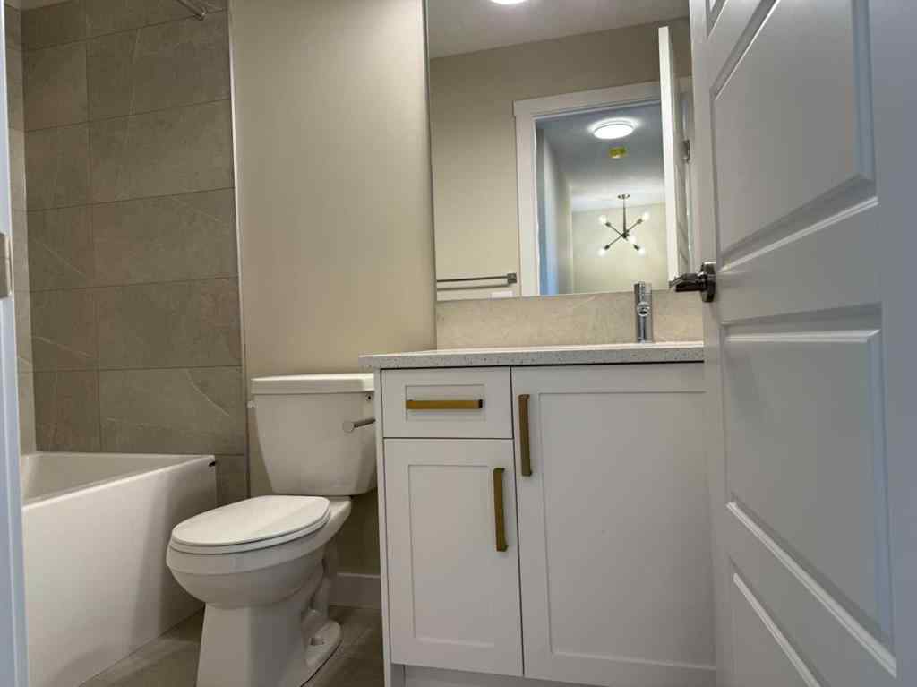 MLS® A2258128 - 318 Sundown Road  in Sunset Ridge Cochrane, Residential