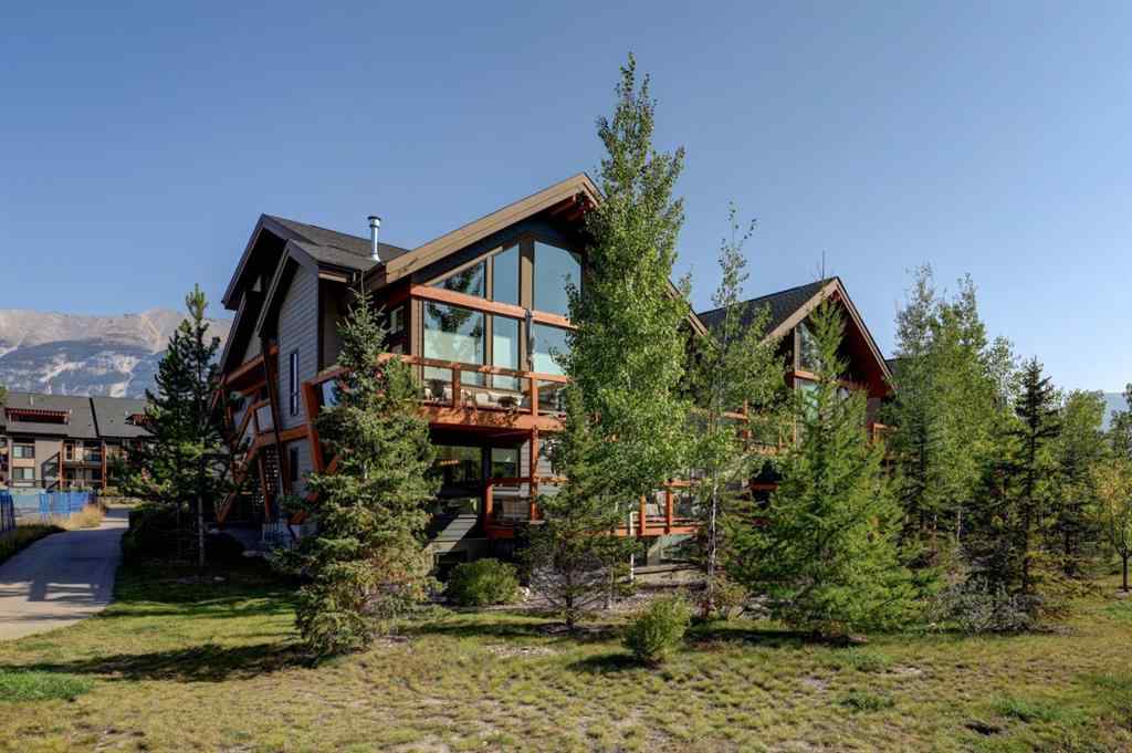 MLS® A2258136 - Unit #803 105 Stewart Creek Rise  in Three Sisters Canmore, Residential