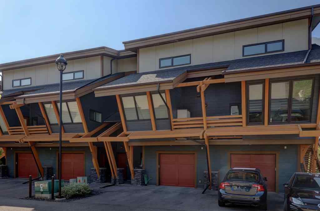 MLS® A2258136 - Unit #803 105 Stewart Creek Rise  in Three Sisters Canmore, Residential