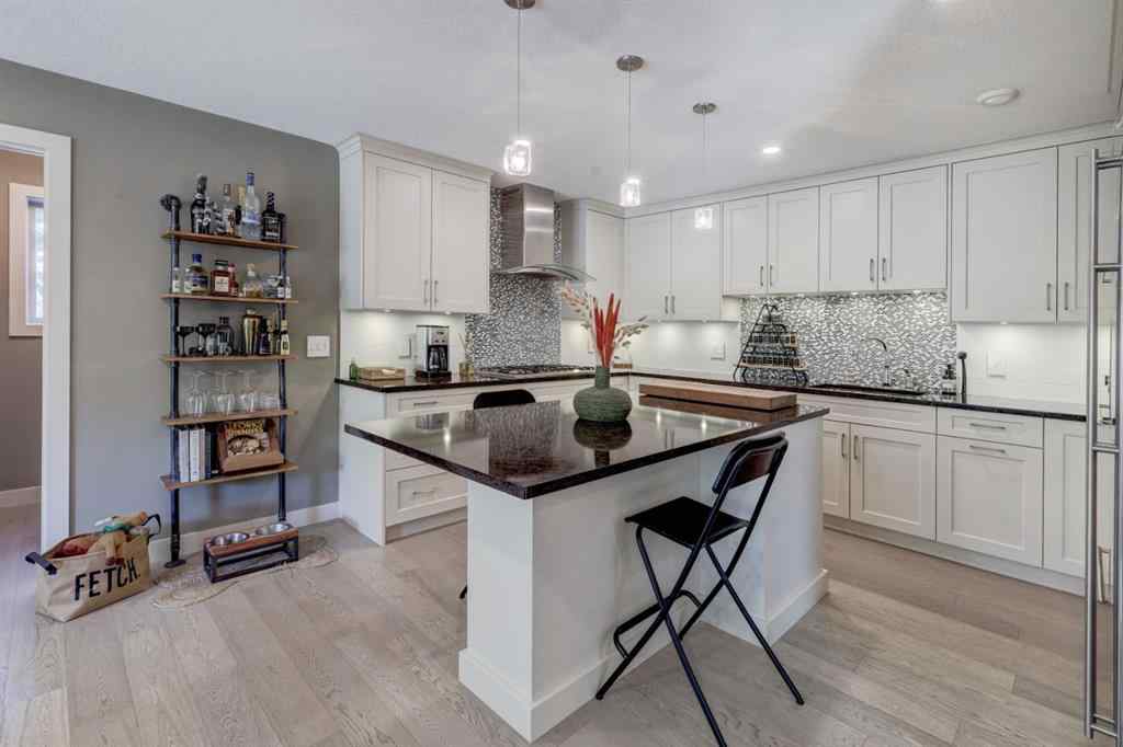MLS® A2258136 - Unit #803 105 Stewart Creek Rise  in Three Sisters Canmore, Residential