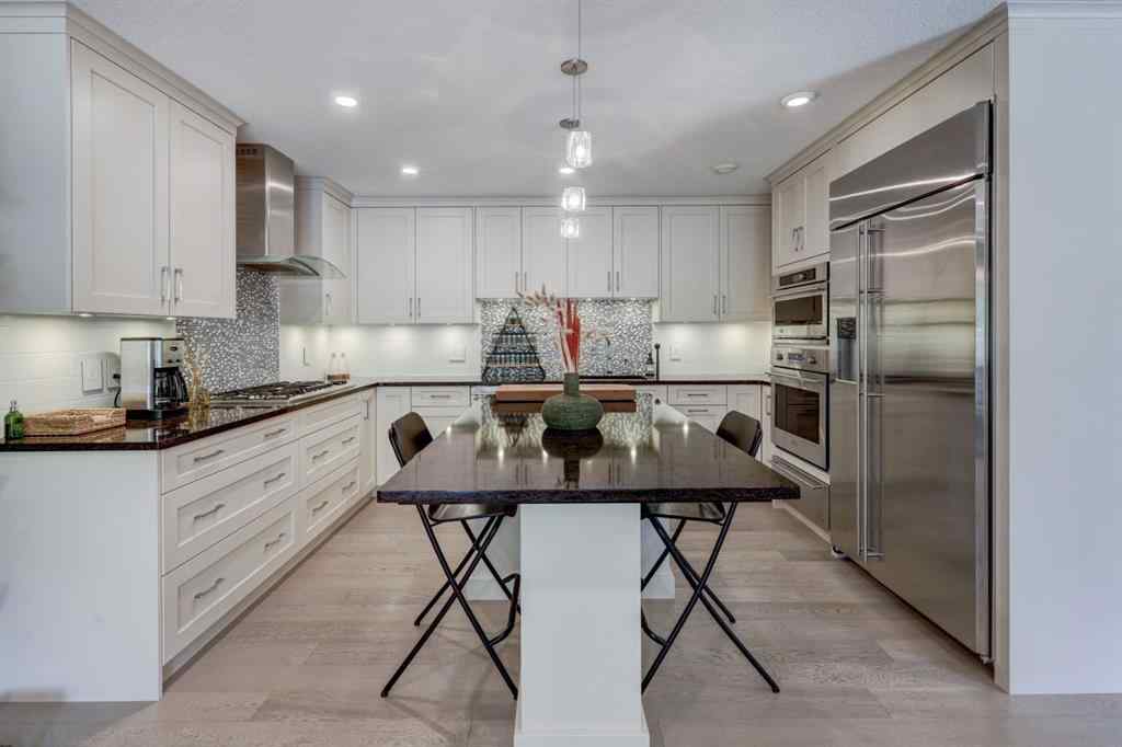MLS® A2258136 - Unit #803 105 Stewart Creek Rise  in Three Sisters Canmore, Residential