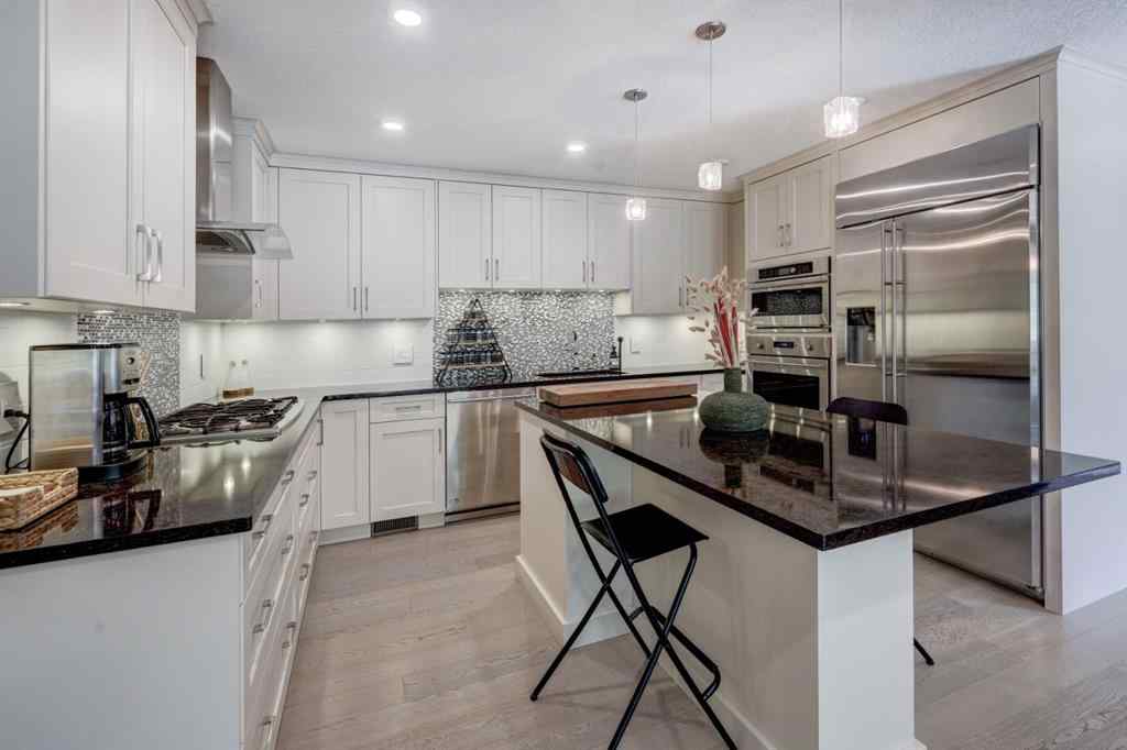 MLS® A2258136 - Unit #803 105 Stewart Creek Rise  in Three Sisters Canmore, Residential