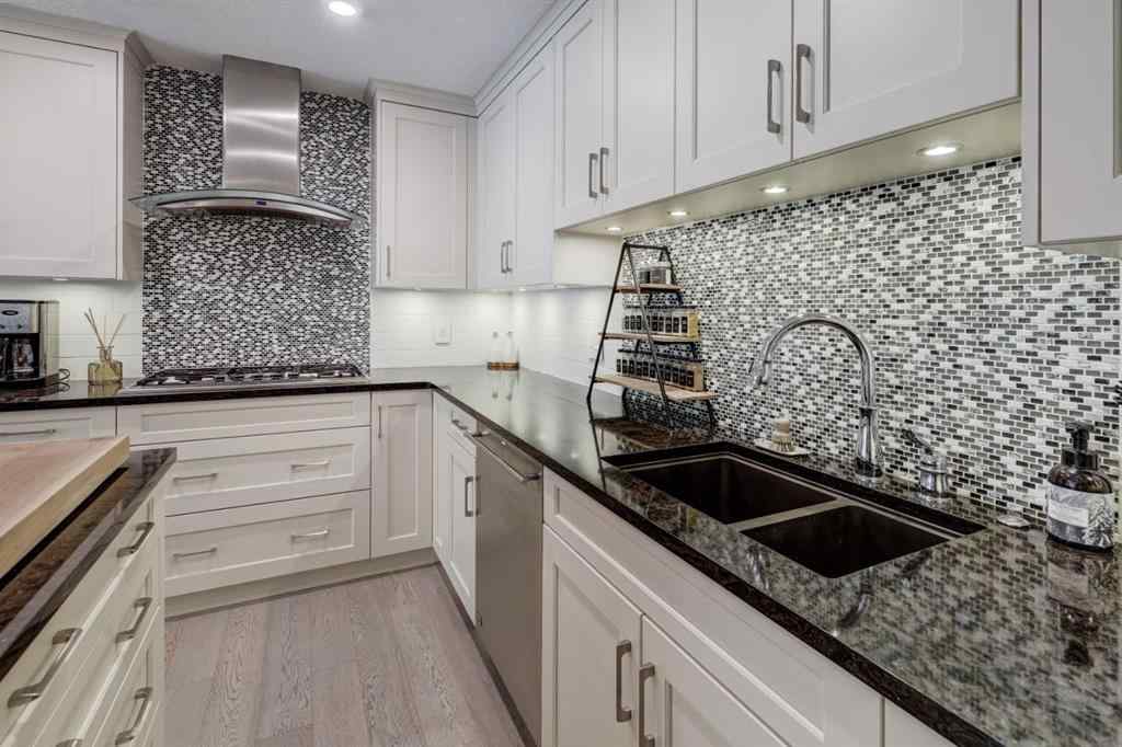 MLS® A2258136 - Unit #803 105 Stewart Creek Rise  in Three Sisters Canmore, Residential