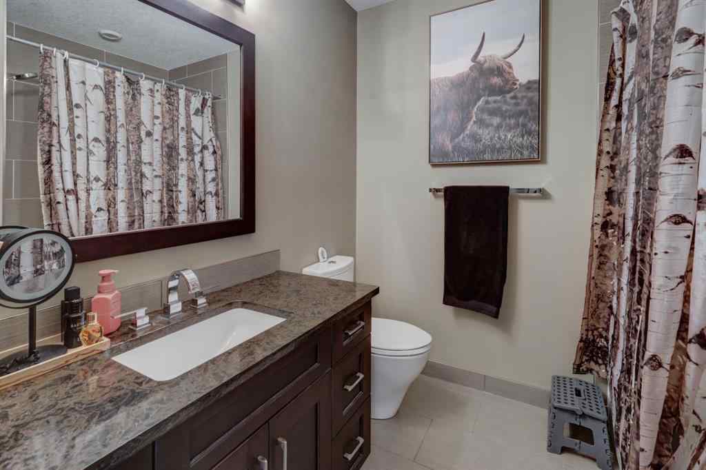 MLS® A2258136 - Unit #803 105 Stewart Creek Rise  in Three Sisters Canmore, Residential