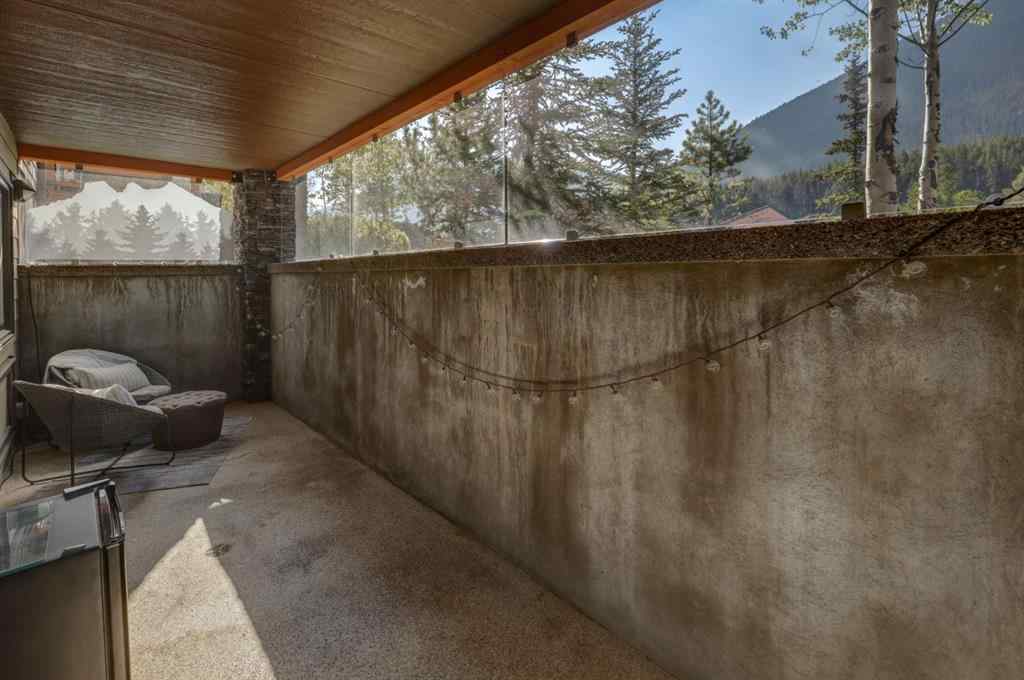 MLS® A2258136 - Unit #803 105 Stewart Creek Rise  in Three Sisters Canmore, Residential
