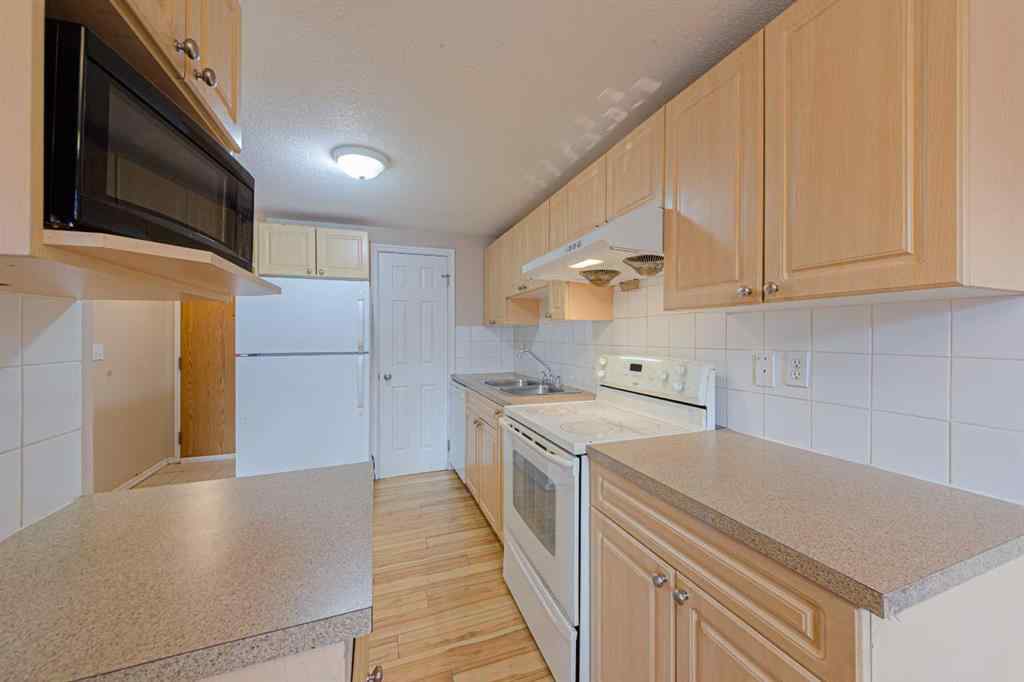 MLS® A2258145 - Unit #103 6825 Centre Street NW in Huntington Hills Calgary, Residential