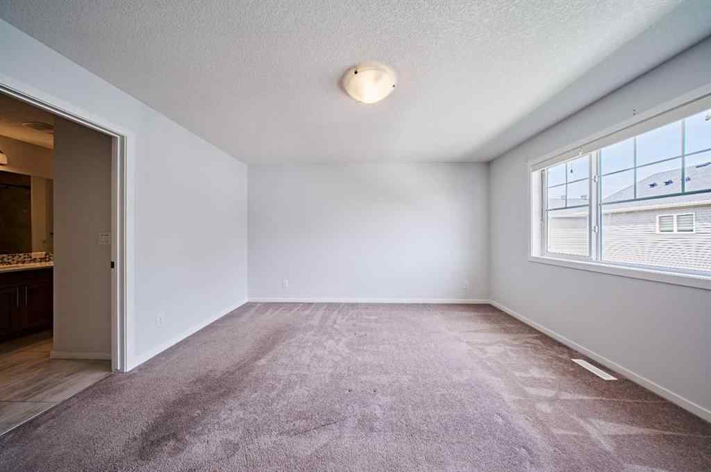 MLS® A2258149 - 254 Carringham Road NW in Carrington Calgary, Residential