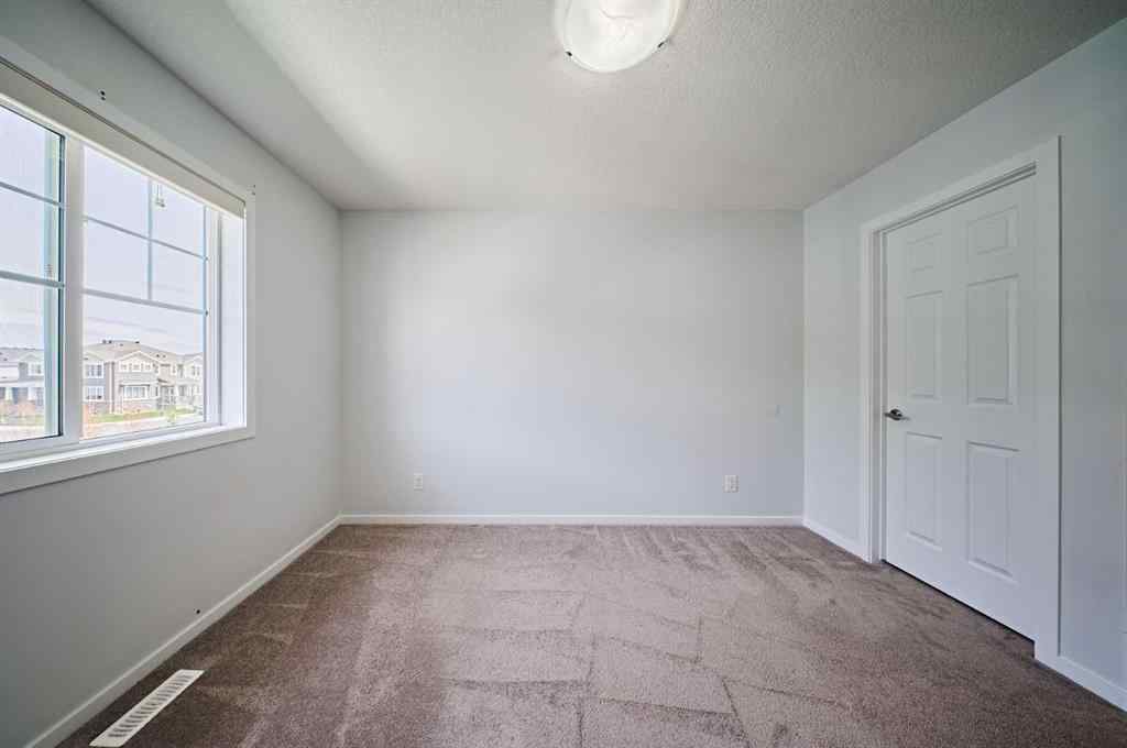 MLS® A2258149 - 254 Carringham Road NW in Carrington Calgary, Residential