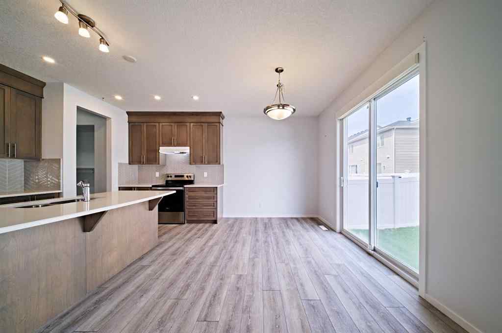 MLS® A2258149 - 254 Carringham Road NW in Carrington Calgary, Residential