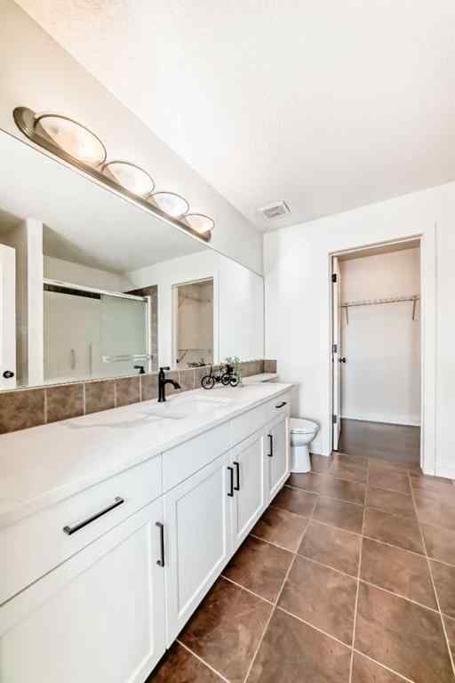 MLS® A2258150 - 83 Bridlecrest Street SW in Bridlewood Calgary, Residential