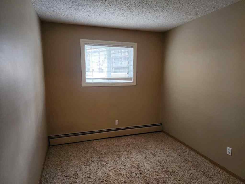 MLS® A2258158 - Unit #103 5812 61 Street  in Riverside Meadows Red Deer, Residential
