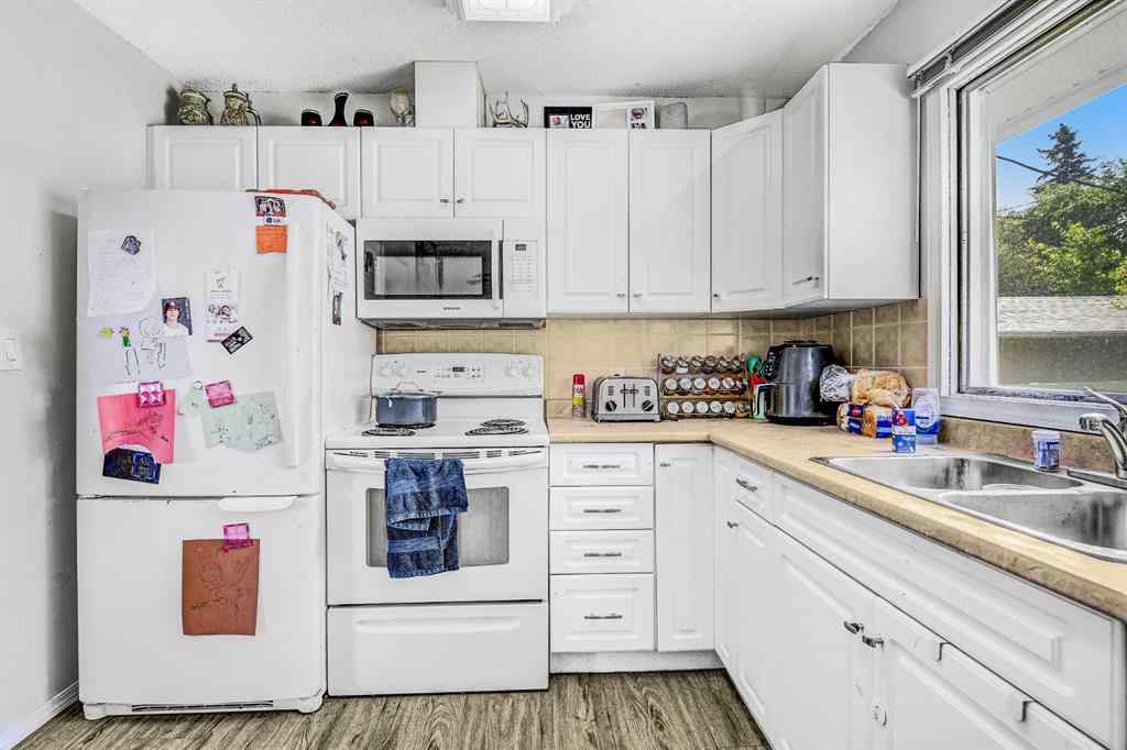 MLS® A2258192 - 9825 91 Avenue  in Highland Park Grande Prairie, Residential