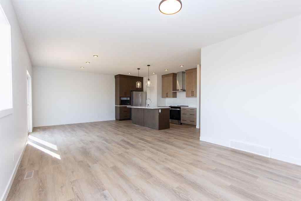 MLS® A2258223 - 49 Trinity Street  in Trinity Crossing Lacombe, Residential