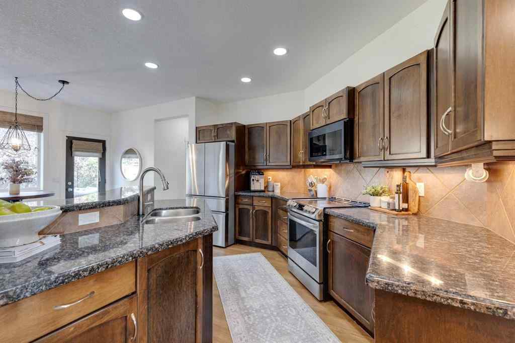 MLS® A2258231 - 107 Aspen Stone Crescent SW in Aspen Woods Calgary, Residential