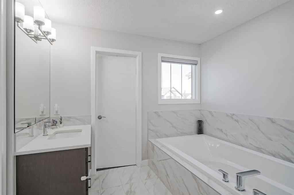 MLS® A2258238 - 128 Masters Street SE in Mahogany Calgary, Residential
