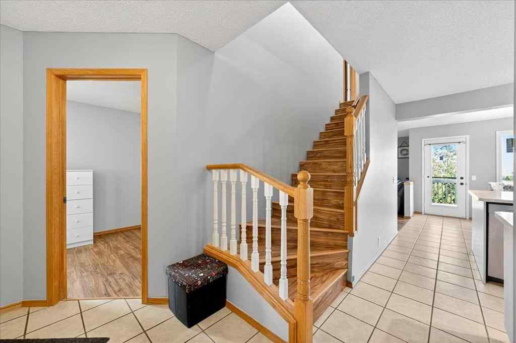 MLS® A2258245 - 64 Macewan Park Rise NW in MacEwan Glen Calgary, Residential