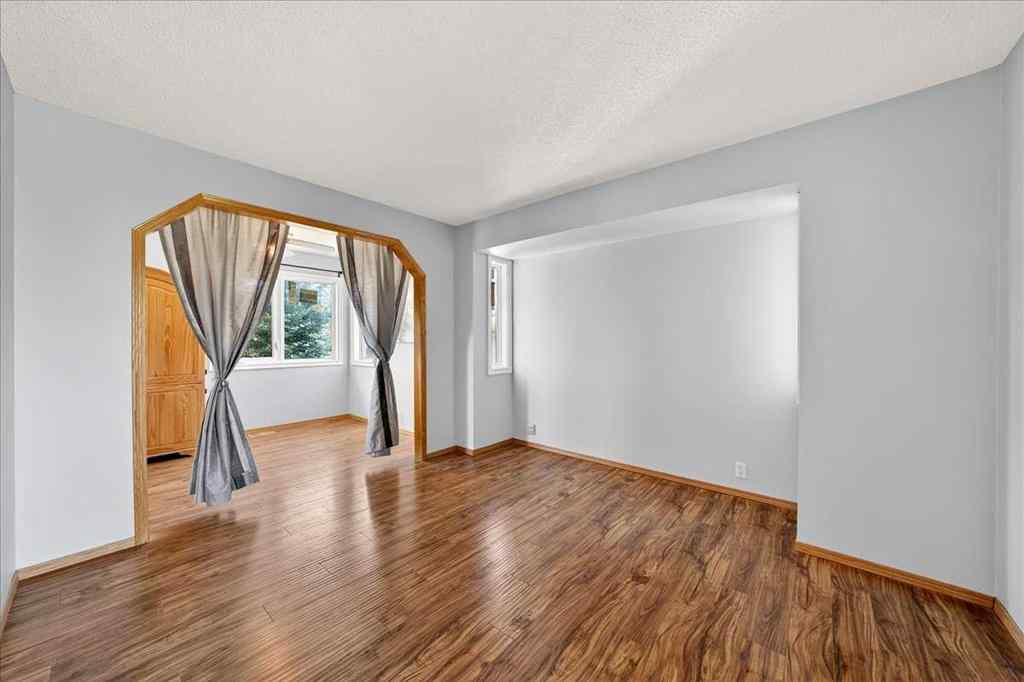 MLS® A2258245 - 64 Macewan Park Rise NW in MacEwan Glen Calgary, Residential