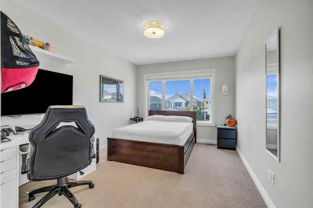 MLS® A2258268 - 311 Tremblant Heights SW in Springbank Hill Calgary, Residential