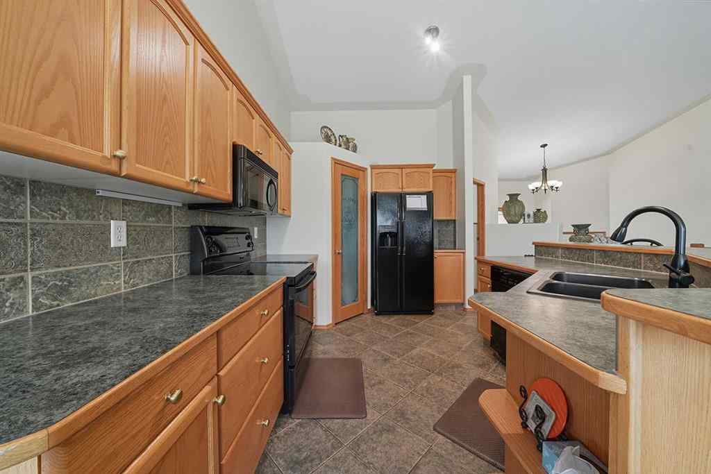 MLS® A2258298 - 61 Leung Close  in Lancaster Green Red Deer, Residential