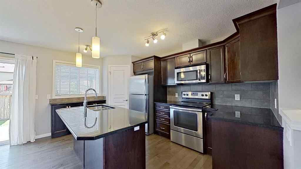 MLS® A2258304 - 63 Elgin Meadows Park SE in McKenzie Towne Calgary, Residential
