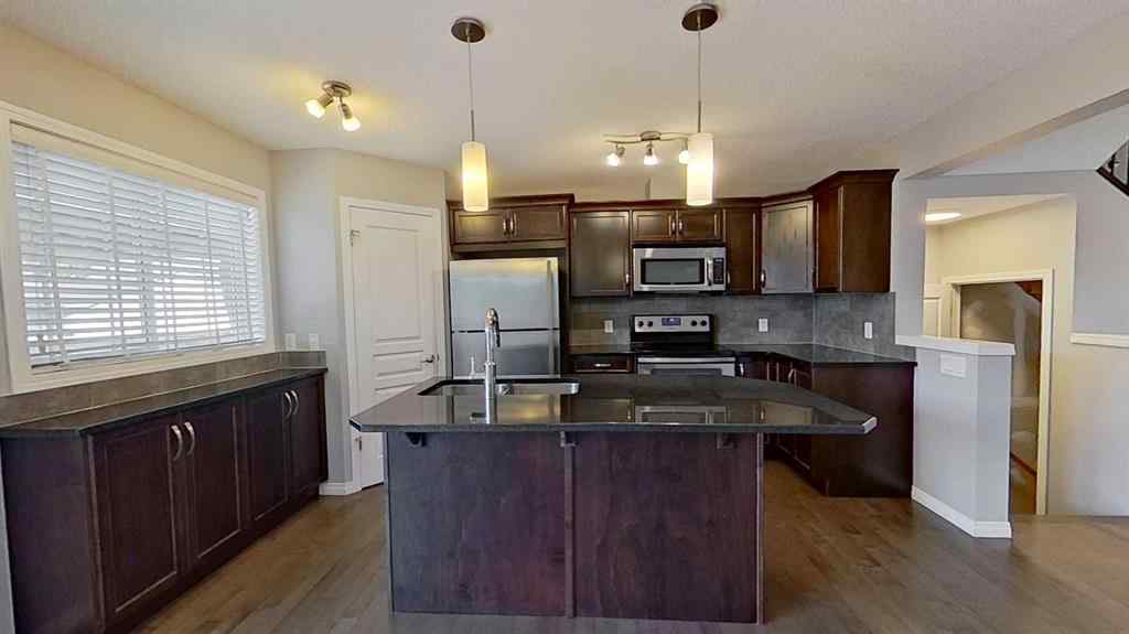 MLS® A2258304 - 63 Elgin Meadows Park SE in McKenzie Towne Calgary, Residential