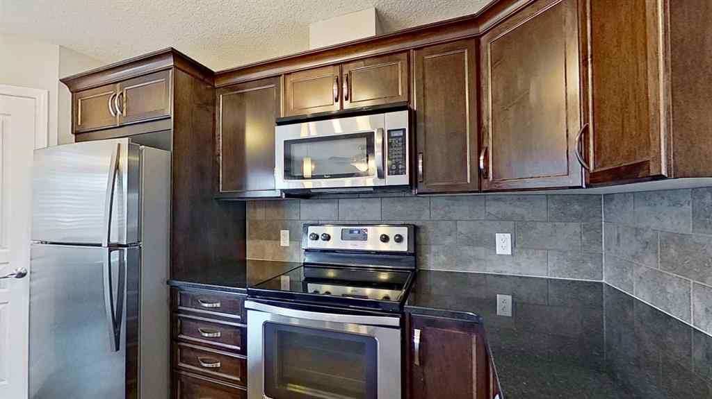 MLS® A2258304 - 63 Elgin Meadows Park SE in McKenzie Towne Calgary, Residential