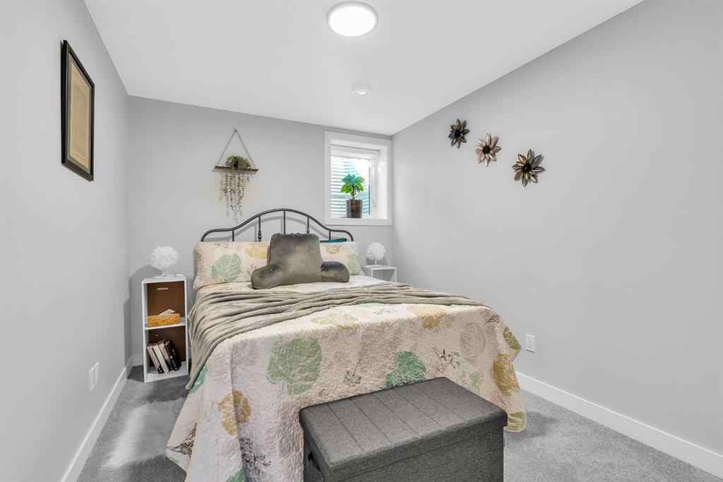 MLS® A2258347 - 1098 Creekside Boulevard SW in Pine Creek Calgary, Residential