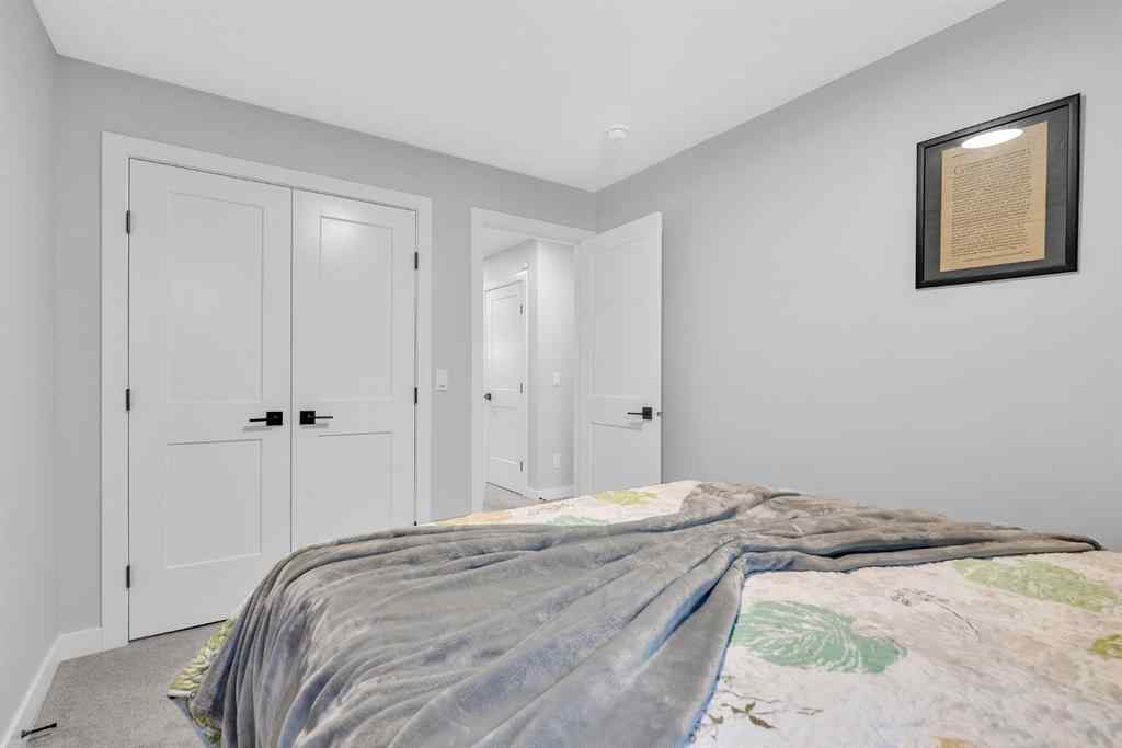 MLS® A2258347 - 1098 Creekside Boulevard SW in Pine Creek Calgary, Residential