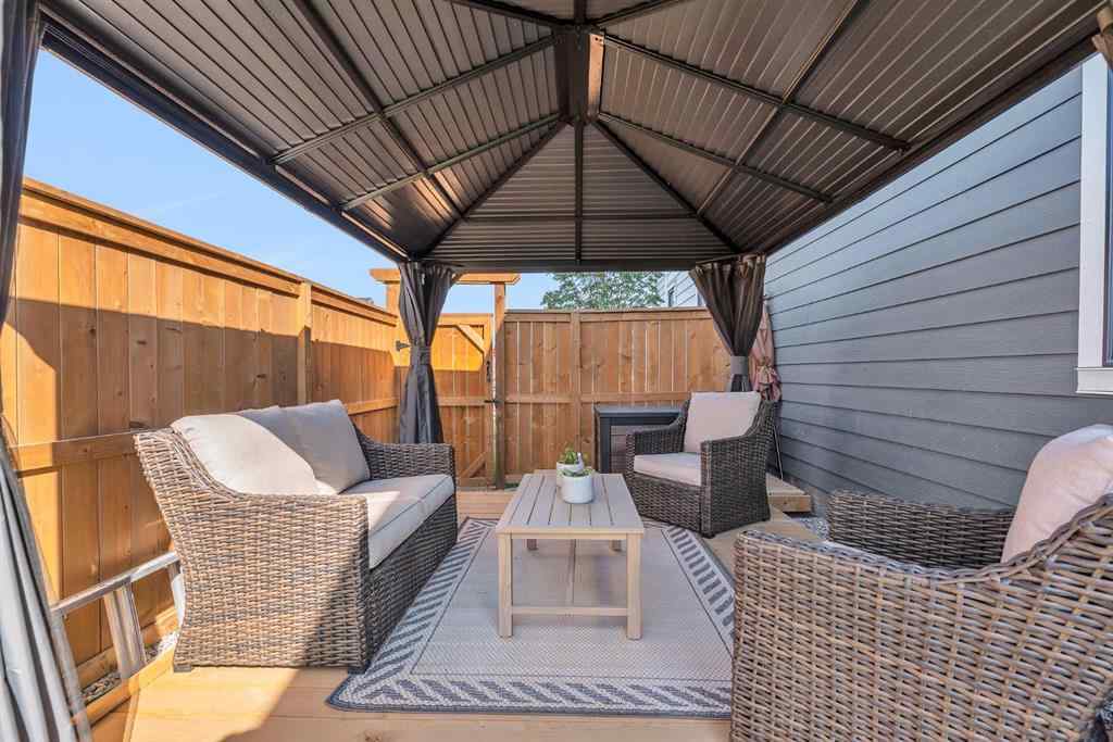 MLS® A2258347 - 1098 Creekside Boulevard SW in Pine Creek Calgary, Residential