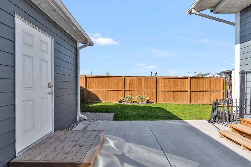 MLS® A2258347 - 1098 Creekside Boulevard SW in Pine Creek Calgary, Residential
