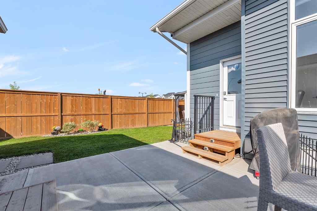 MLS® A2258347 - 1098 Creekside Boulevard SW in Pine Creek Calgary, Residential